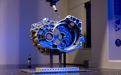 CMM probe inspecting a machined component at Status Metrology